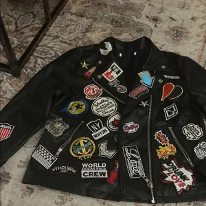 Black Leather Jacket with Colorful Patches